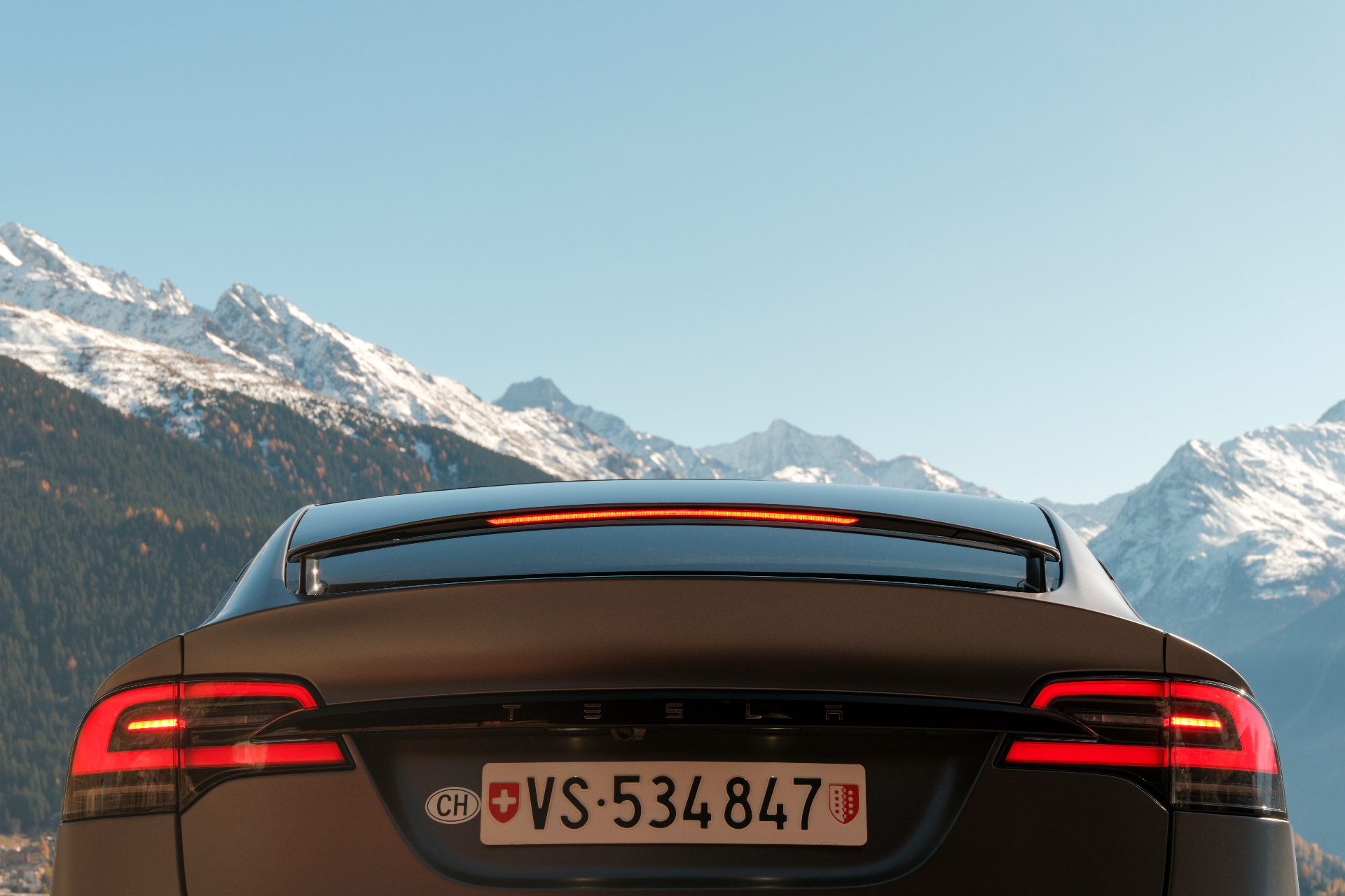 Tesla Model X with Swiss Alps backdrop